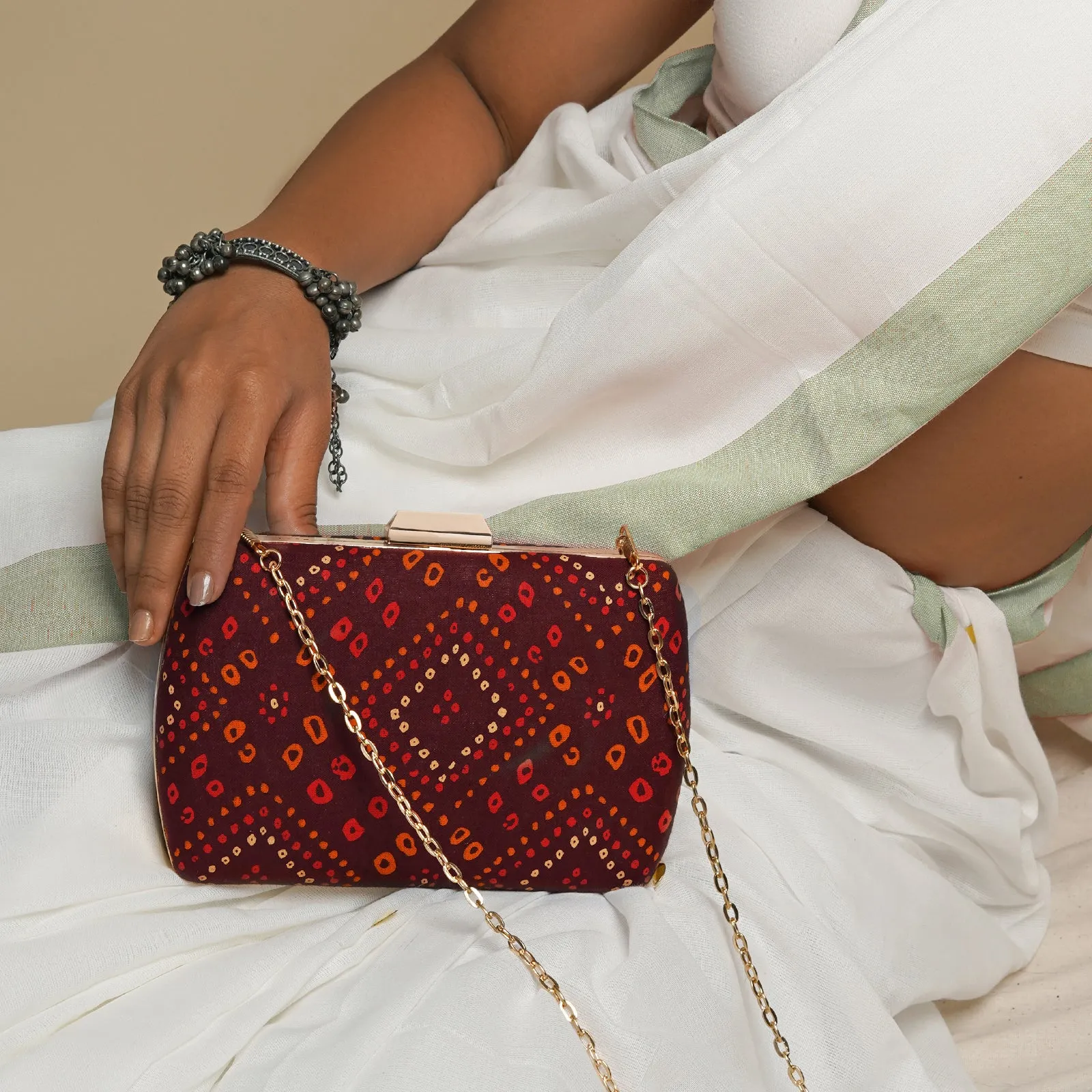 Maroon Magic Stone and Print Clutch